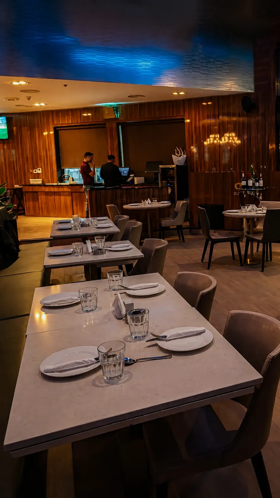 Interior dining space with elegantly set tables